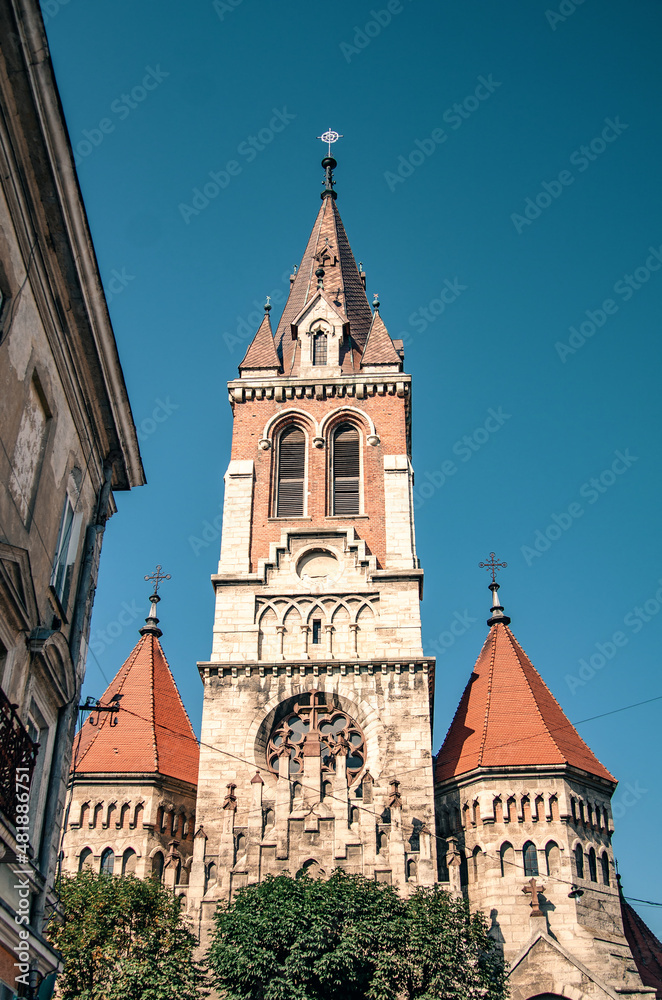 Ancient gothic cathedral. Beautiful vertical photo. Chortkiv, Ukraine.