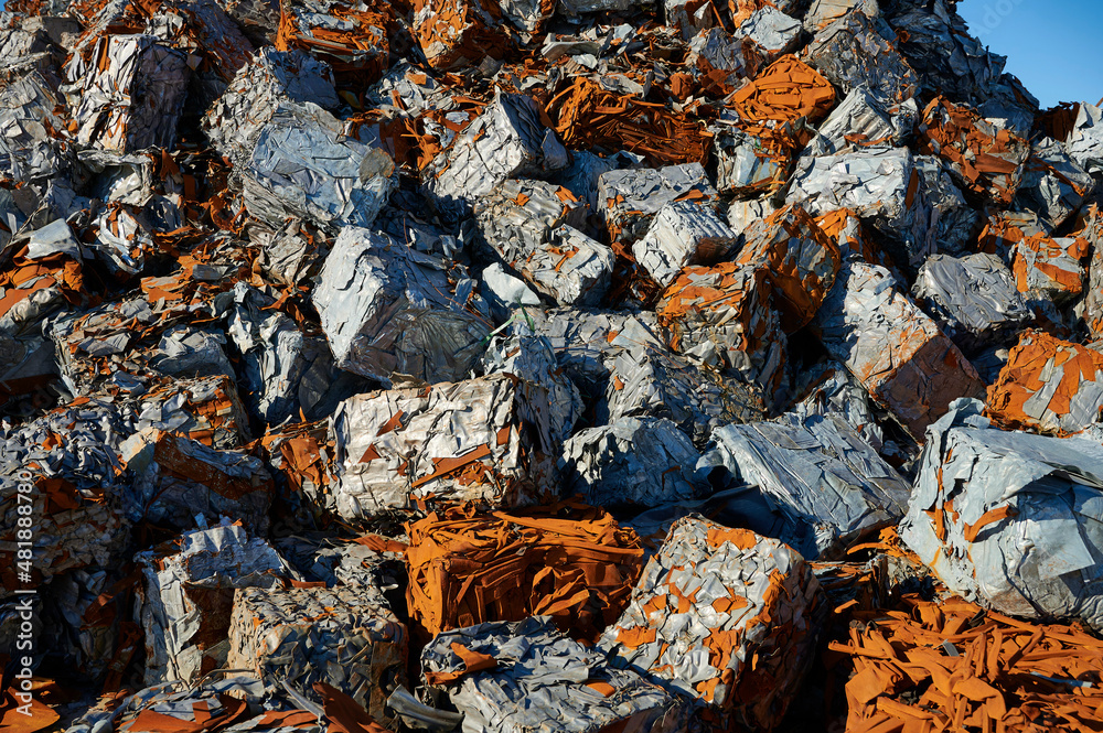 Scrap blocks prepared for export on the dock of the port of Bilbao Scrap blocks prepared for export on the dock of the port of Bilbao