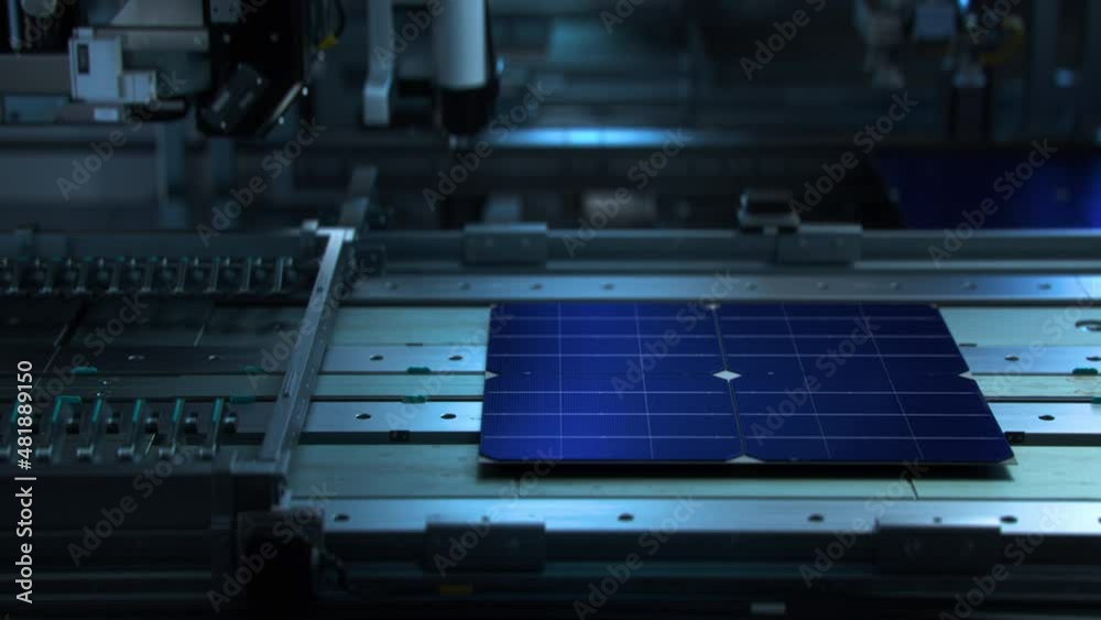 Solar Cells are Being Moved and Tested on Conveyor during Solar Panel Production Process on Advanced Factory Solar Cells are Being Moved and Tested on Conveyor during Solar Panel Production Process on Advanced Factory