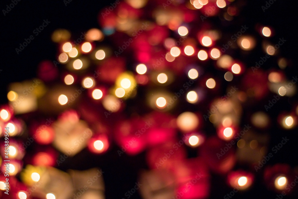 Multicolored defocused bokeh lights background Multicolored defocused bokeh lights background