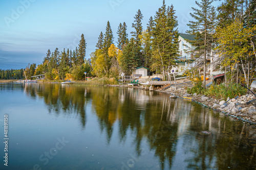 Fototapeta Naklejka Na Ścianę i Meble -  Fall Colors Surround a Lake