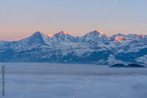 Swiss mountains evening with snow and fog
