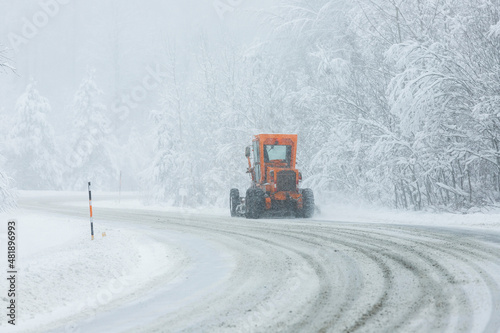 Winter wonderland landscapes. The trees are covered with snow. Cold weather. The snowplow is clearing the snow from the roads. Yedigoller National Park, (Yedigöller Milli Park). Bolu, Turkey.