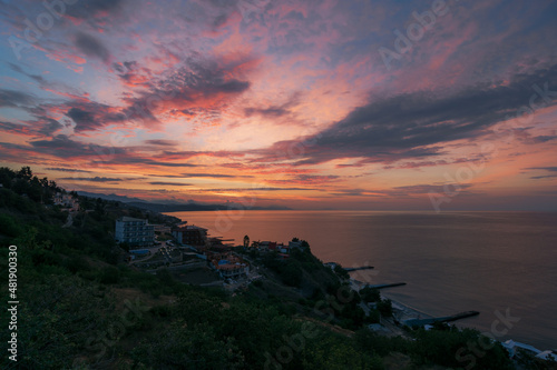 Colorful cloudy sunrise over the sea