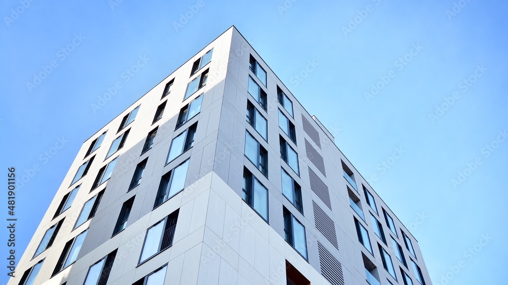  Facade of a modern apartment condominium in a sunny day