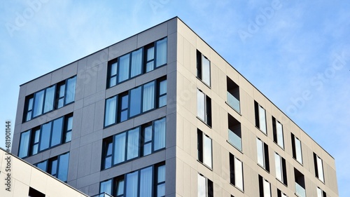 Facade of a modern apartment condominium in a sunny day