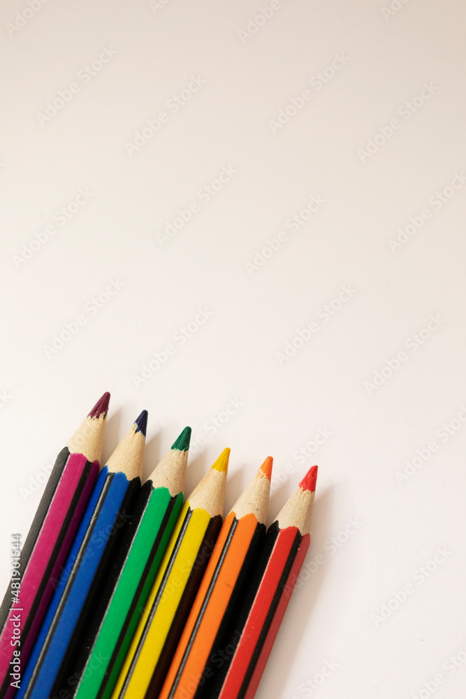 Pencils colorful as the LGBTQ+ pride flag, vertical with copy space Pencils colorful as the LGBTQ+ pride flag, vertical with copy space