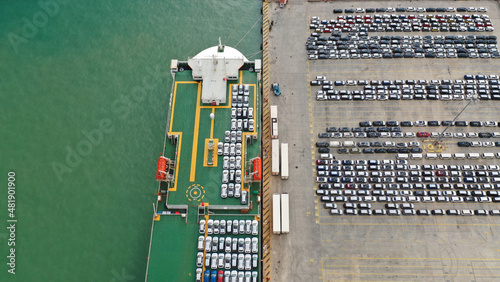 Fotografie Aerial drone top down photo of large car carrier ro ro vessel anchored in car te