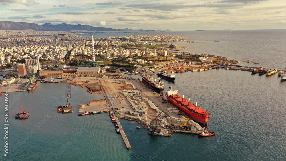 Aerial drone photo of international car and Ro Ro boat terminal in Keratsini area at sunset, Piraeus, Attica, Greece