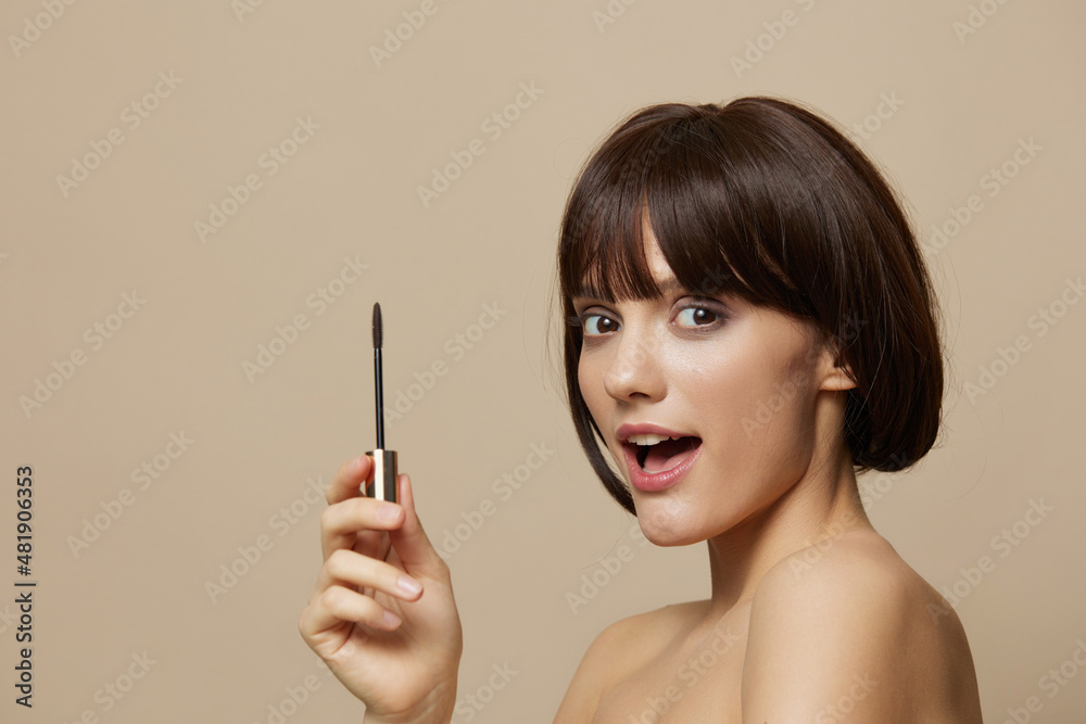 portrait woman smile mascara charm short haircut beige background portrait woman smile mascara charm short haircut beige background