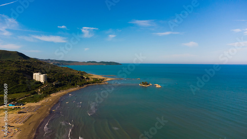 Sand beach aerial, top view of a beautiful sandy beach aerial shot with the waves rolling into the shore