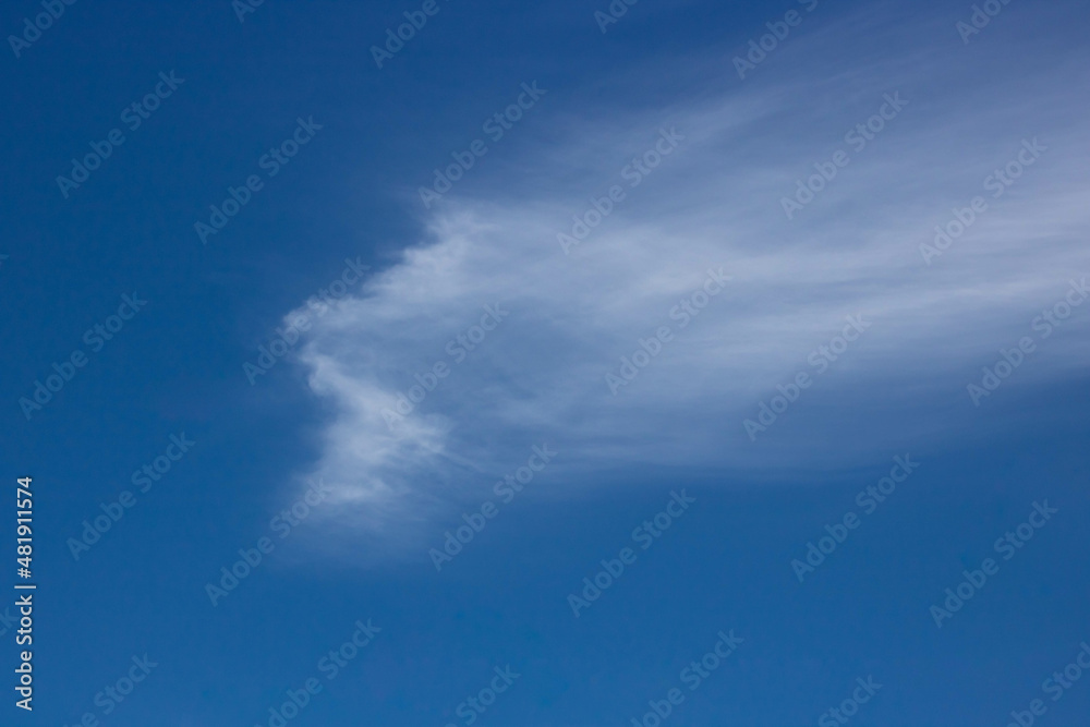 Beautiful sky background. Unusual cirrus clouds in the blue sky Beautiful sky background. Unusual cirrus clouds in the blue sky