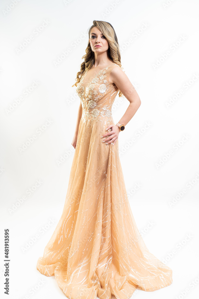 beautiful young blond woman in dress on white studio background beautiful young blond woman in dress on white studio background
