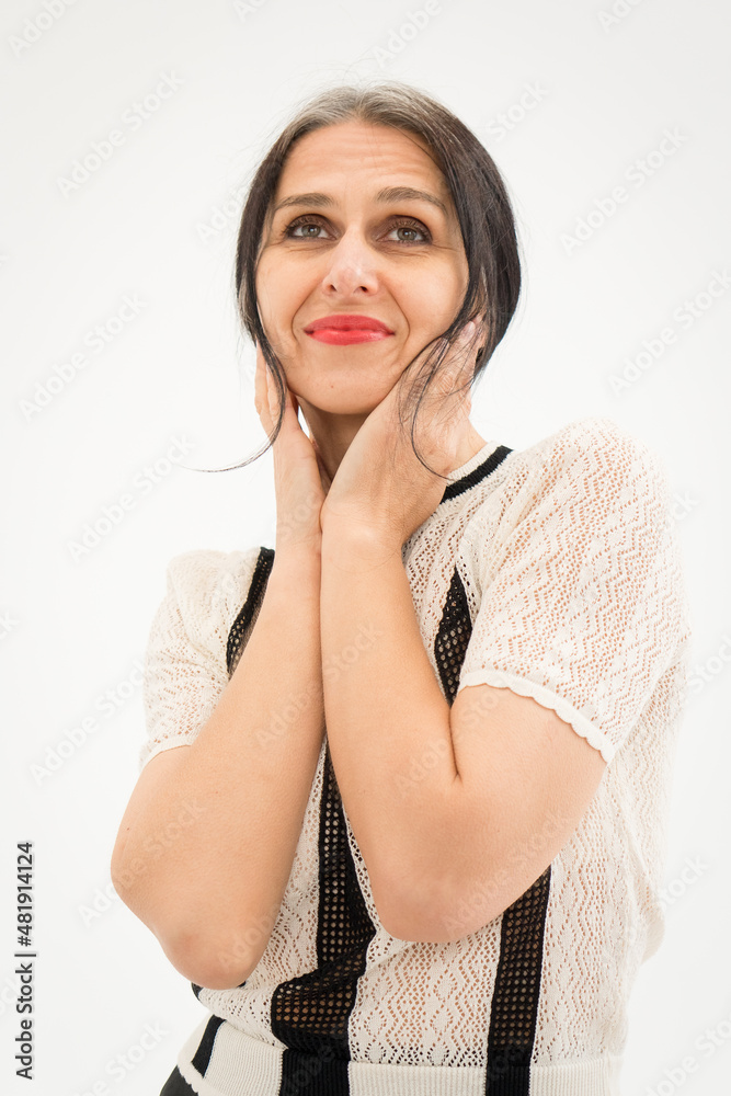 Studio photo of middle aged woman starting getting grey-haired wearing black and white clothes on white background, middle age sexy lady, happy life concept Studio photo of middle aged woman starting getting grey-haired wearing black and white clothes on white background, middle age sexy lady, happy life concept