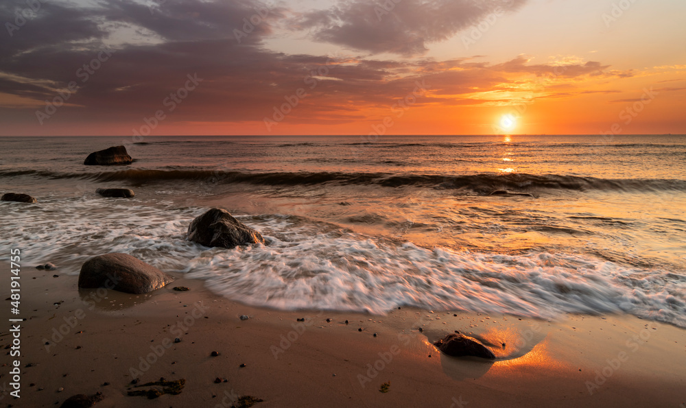 Sunset by the sea. Nature and nature landscape at sunset.