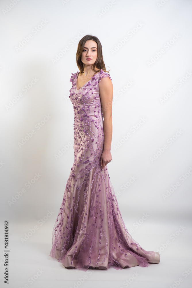 Beautiful woman long evening dress on white background