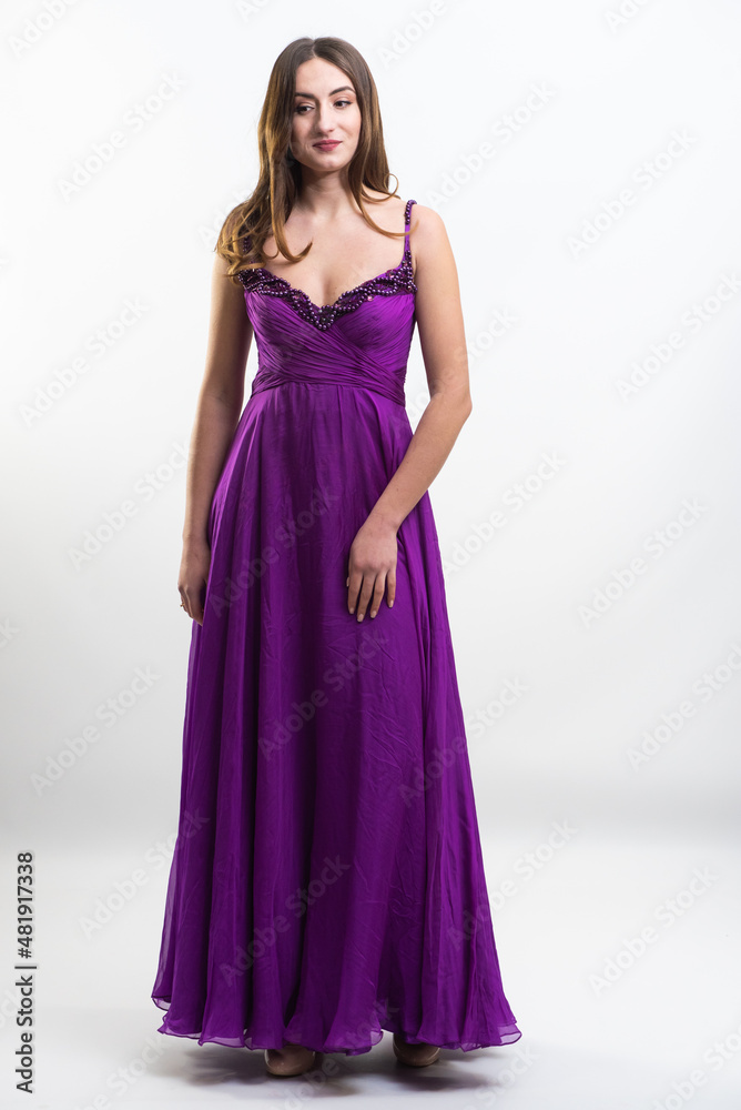 Beautiful woman long evening dress on white background