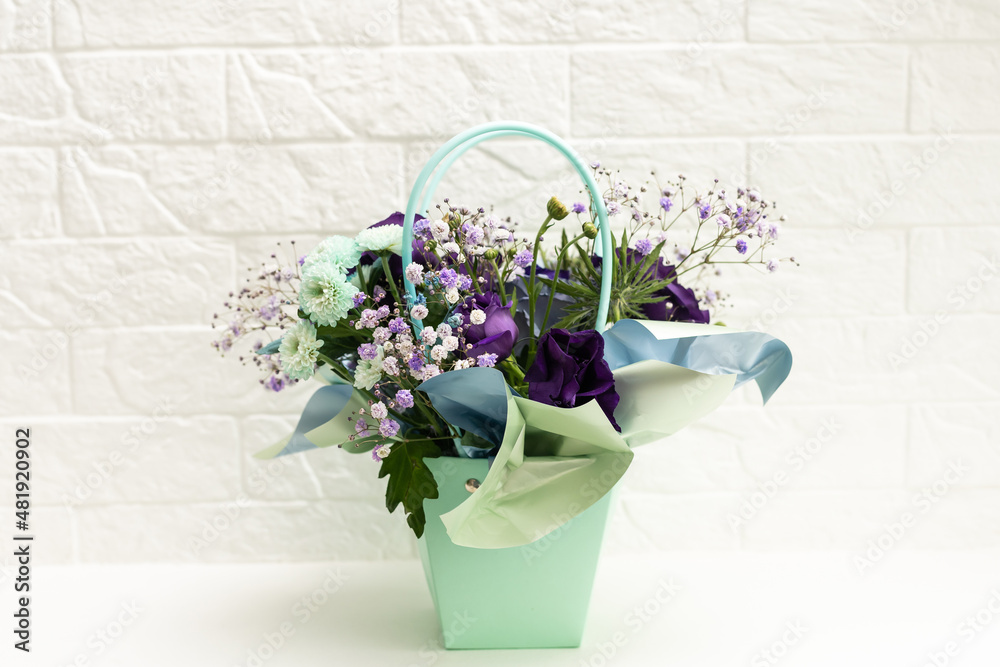 bouquet of purple and white flowers on white background. bouquet of purple and white flowers on white background.