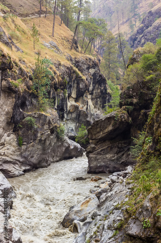 View of the steep banks of the river in the Himalayas