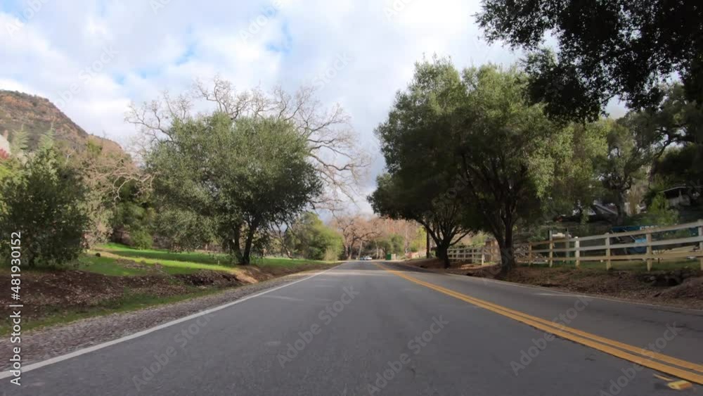 Carlisle Road rear view scenic driving near Lake Sherwood and Westlake Village in Ventura County, California. Carlisle Road rear view scenic driving near Lake Sherwood and Westlake Village in Ventura County, California.