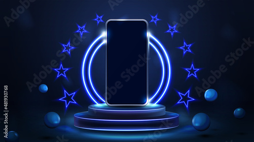 Smartphone on podium of winners with blue neon rings and neon stars in blue scene with realistic bouncing spheres