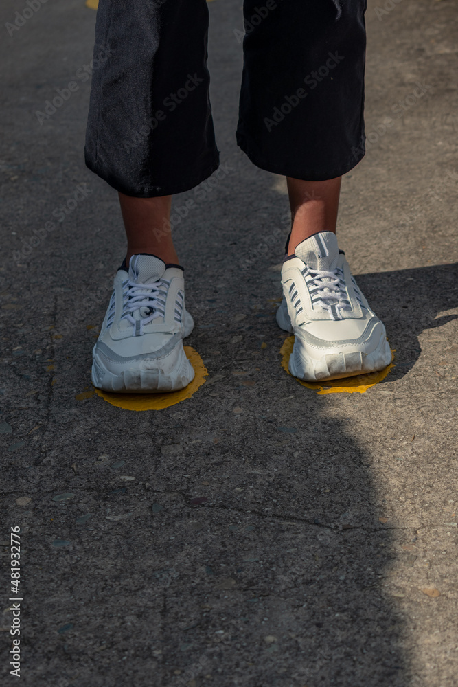 A FEET SIGN VIEW FOR SOCIAL DISTANCE DUE TO COVID_19 A FEET SIGN VIEW FOR SOCIAL DISTANCE DUE TO COVID_19