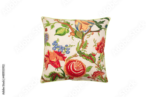 Decorative floral throw pillow isolated on white background.