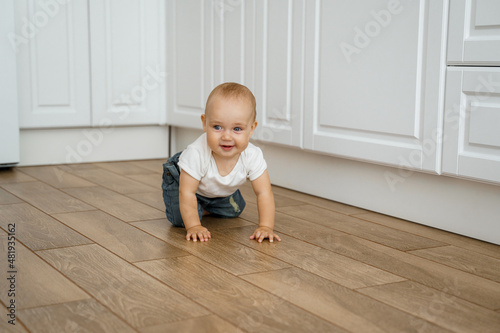 child sitting on floor