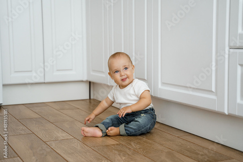boy sitting on the floor