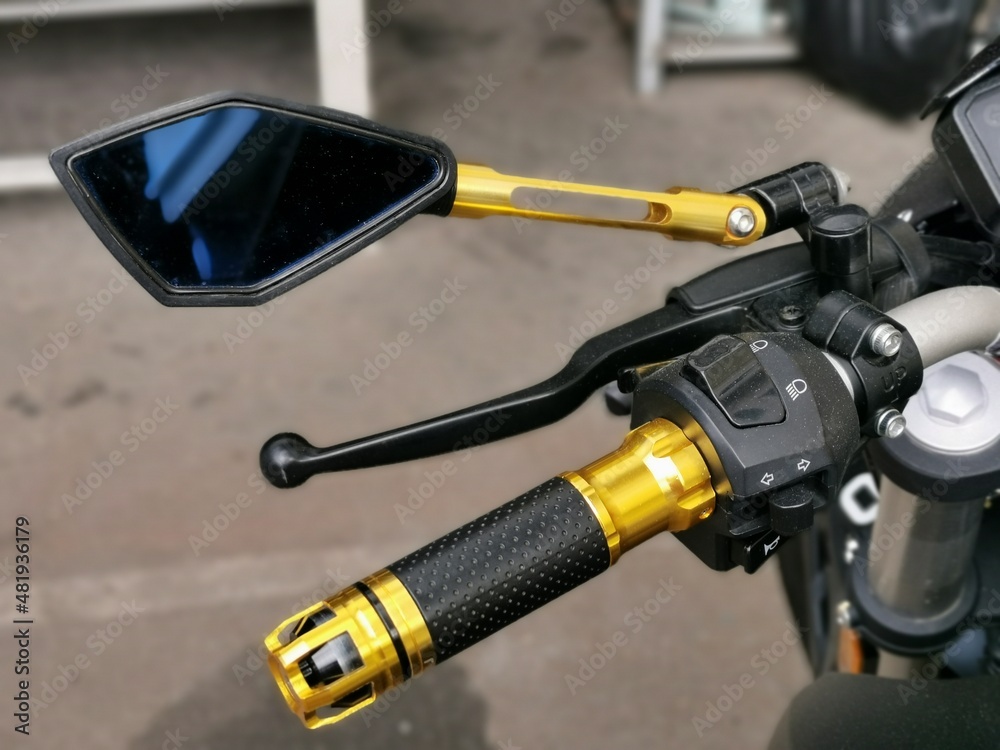 Close up image of motorcycle leftside handle bar.