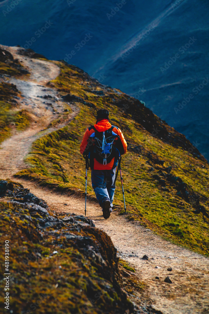 Man Hiking in rugged terrain of Peru