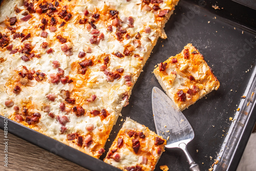 Slovak national dish podpecnik, podplamennik or posuch. Slovak national dish is made sourdough, bryndza, sour cream, bacon and onion photo