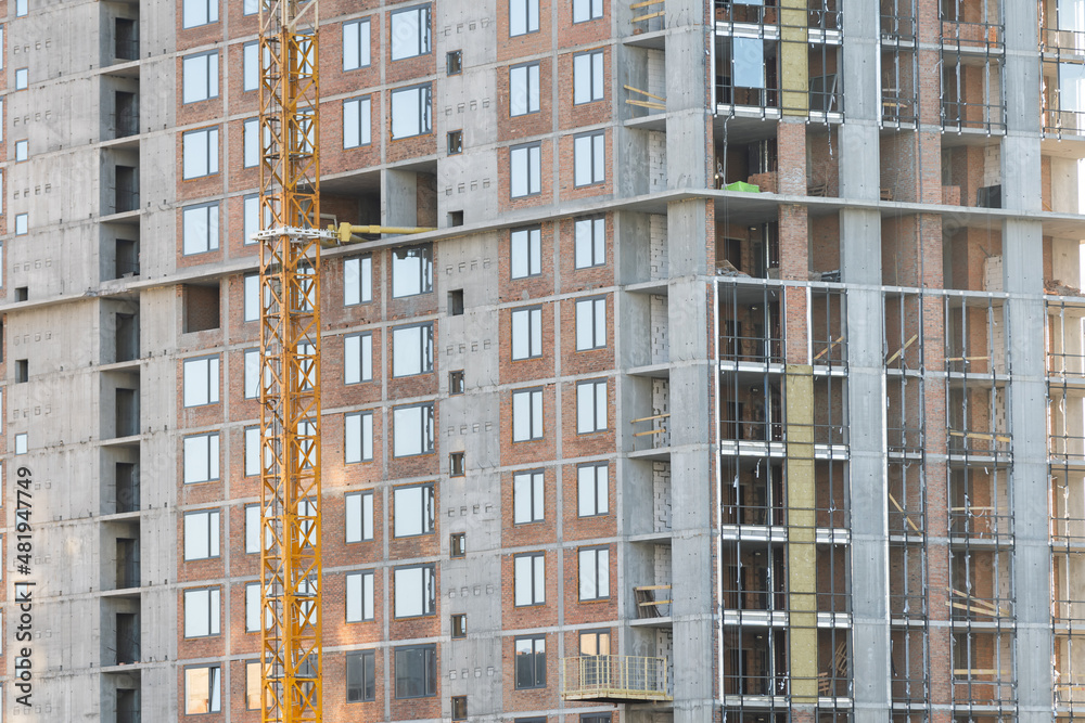 Crane and building construction site