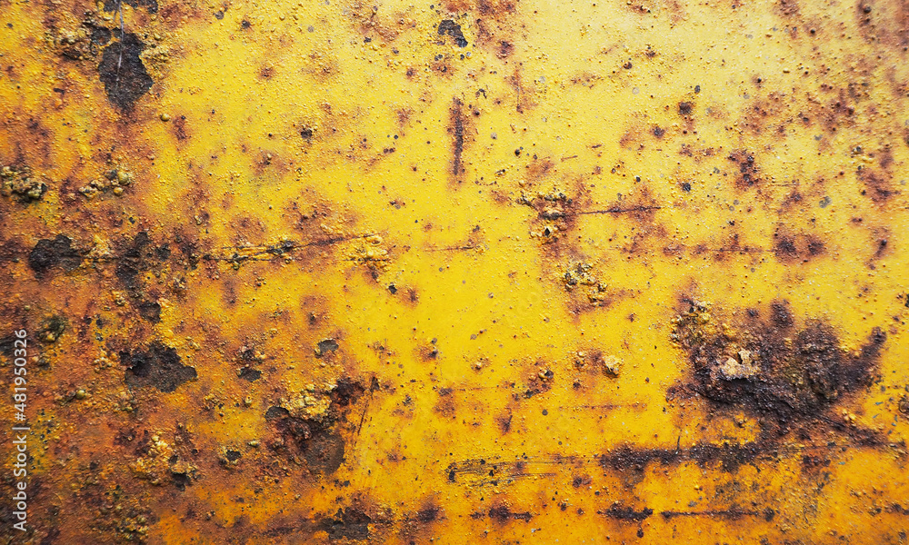 Old yellow metal surface. rusty metal background. Ancient vintage robot texture Old yellow metal surface. rusty metal background. Ancient vintage robot texture