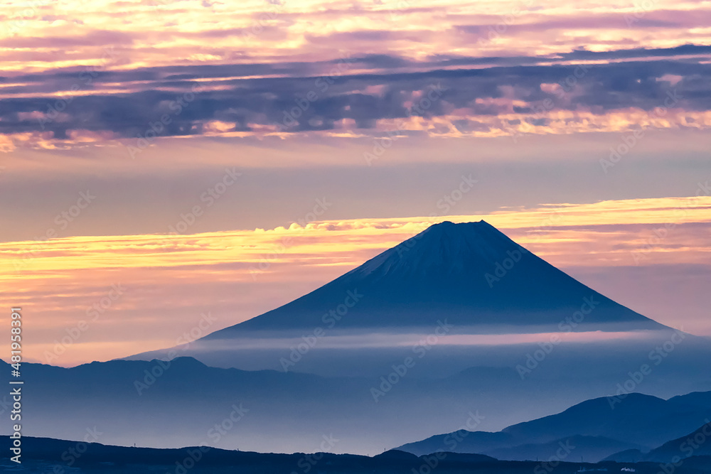Fuji mountain Peak with Autumn Morning Mist and Colourful Twilight Sunrise Sky at Takabocchi Highland, Suwa Lake, Nagano, Japan