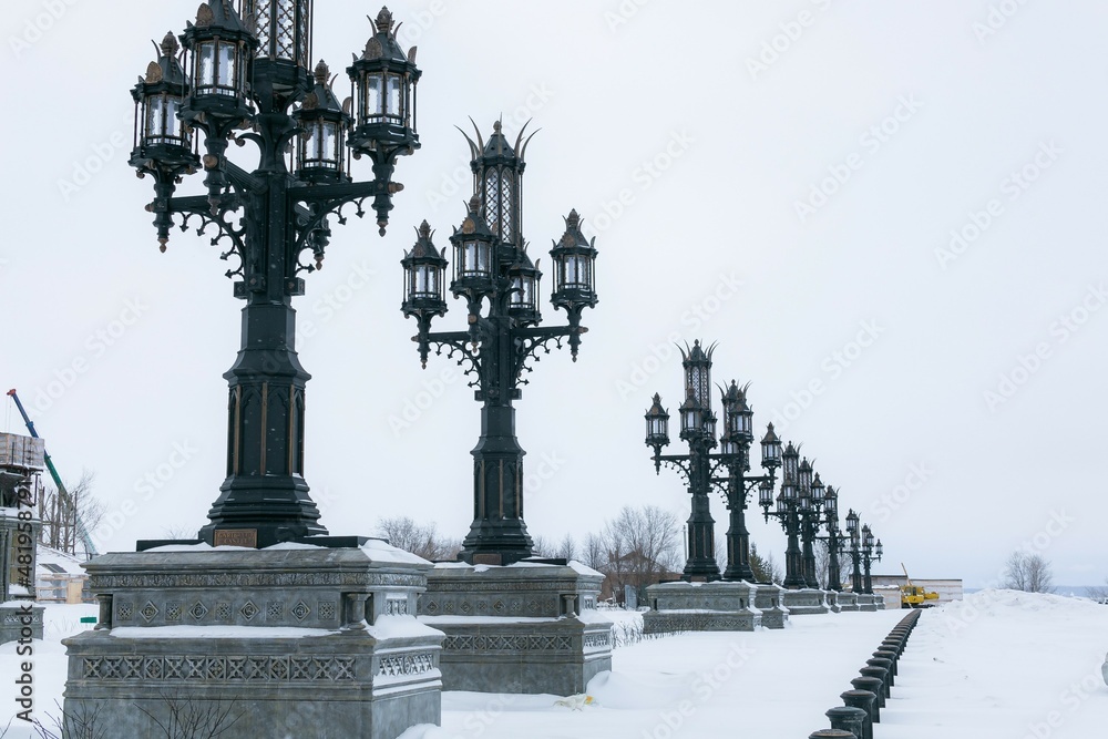 Beautiful stunning row of lampposts in winter