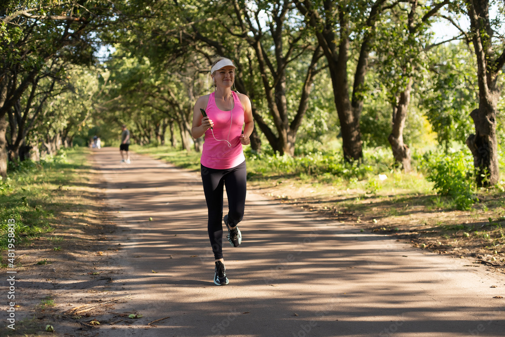 Jogging woman running in park Jogging woman running in park