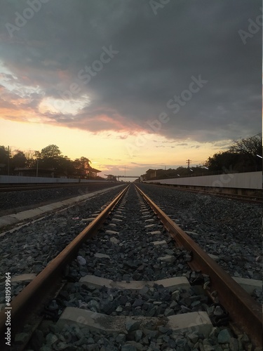 railway train at sunset time. © WoodyDSheriff