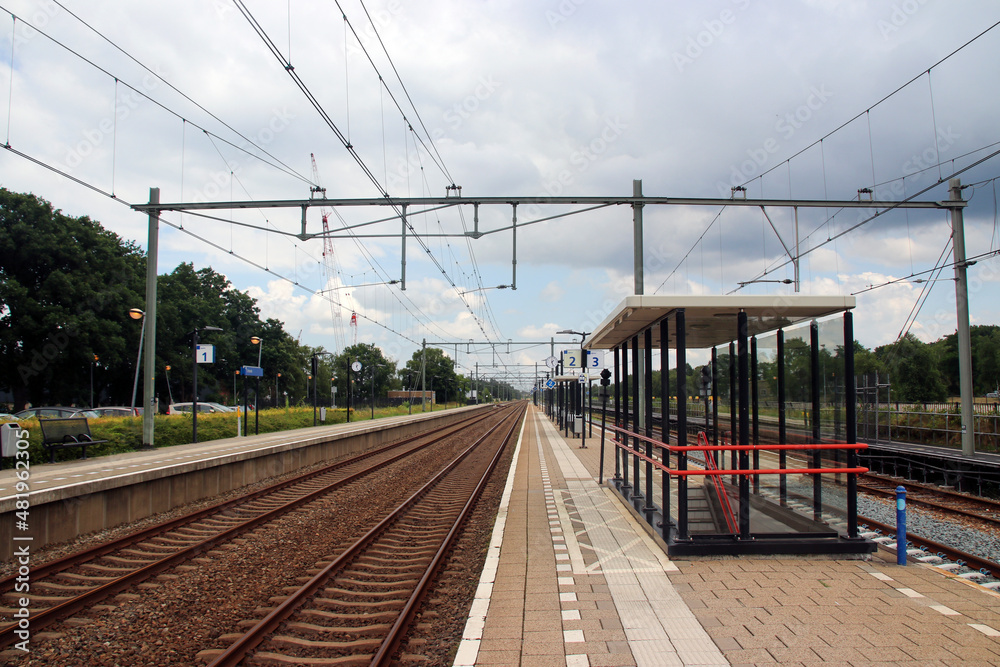Fototapeta premium Railroad tracks with switch to military platform at station 't Harde