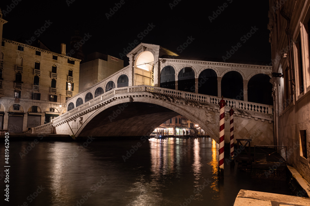 Rialto Bridge or Ponte die Rialto in Venice, Italy, Illuminated at Night