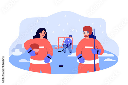 Team of female hockey players standing on ice arena. Girls with helmet, uniform and hockey sticks flat vector illustration. Winter sports, match concept for banner, website design or landing web page