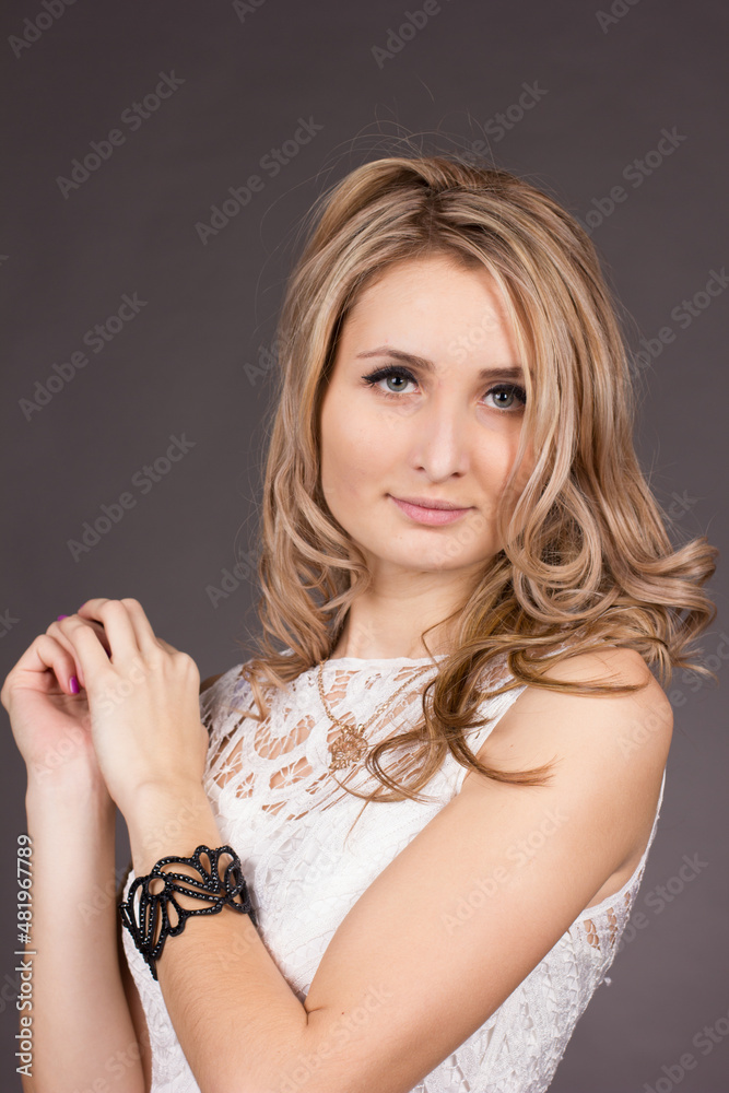 portrait of a young woman in a photo studio