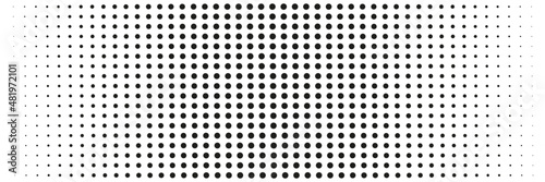 Pattern of black dots of different sizes on a white background