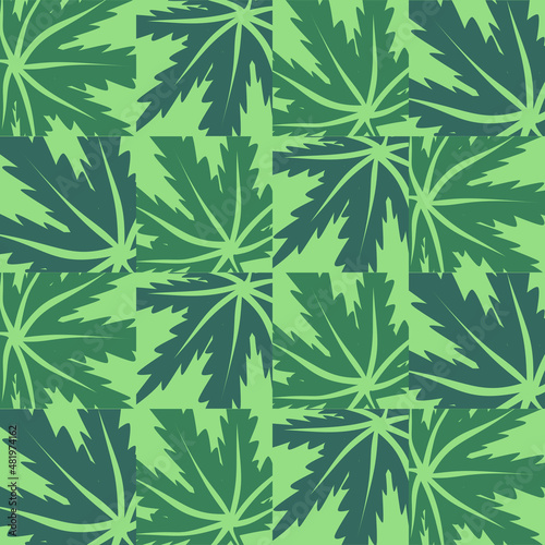 Tropical leaves or Cannabis plant leaves on a green background Seamless pattern, Vector floral background
