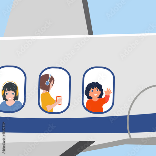 Children in headphones are flying on an airplane. Their faces are visible in the porthole. A fun journey. teenagers on board. Passengers look out the window during the flight.Vector illustration
