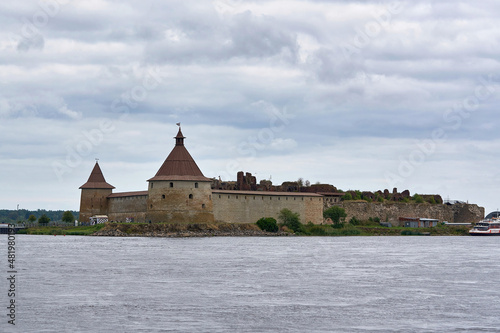 Natural landscape with a view of the old fortress by the lake