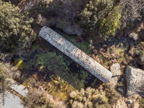Aerial view of the Monolith of Algajola. A large granite column measuring 17.36m by 2.74m cut in 1837 to be used for a statue of Napoleon 1st but could not be transported to Ajaccio