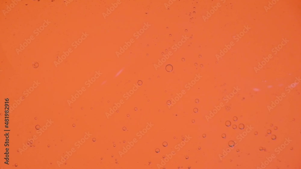 Oil bubbles in slow motion, gradient lighting, macro, template, background for perfume advertising