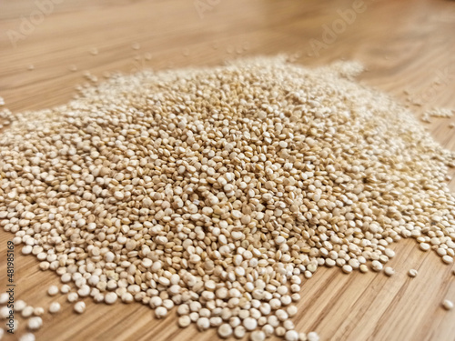 Quinoa on wooden table