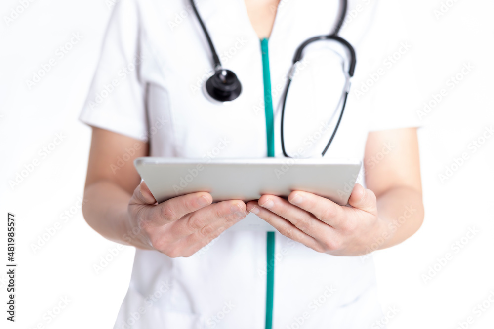 Doctor holding a tablet. white background. Doctor holding a tablet. white background.